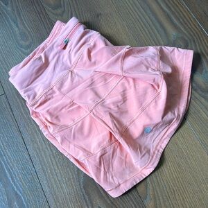 Orange ish Lululemon skort, Size 8, worn only a couple times, was too big on me.